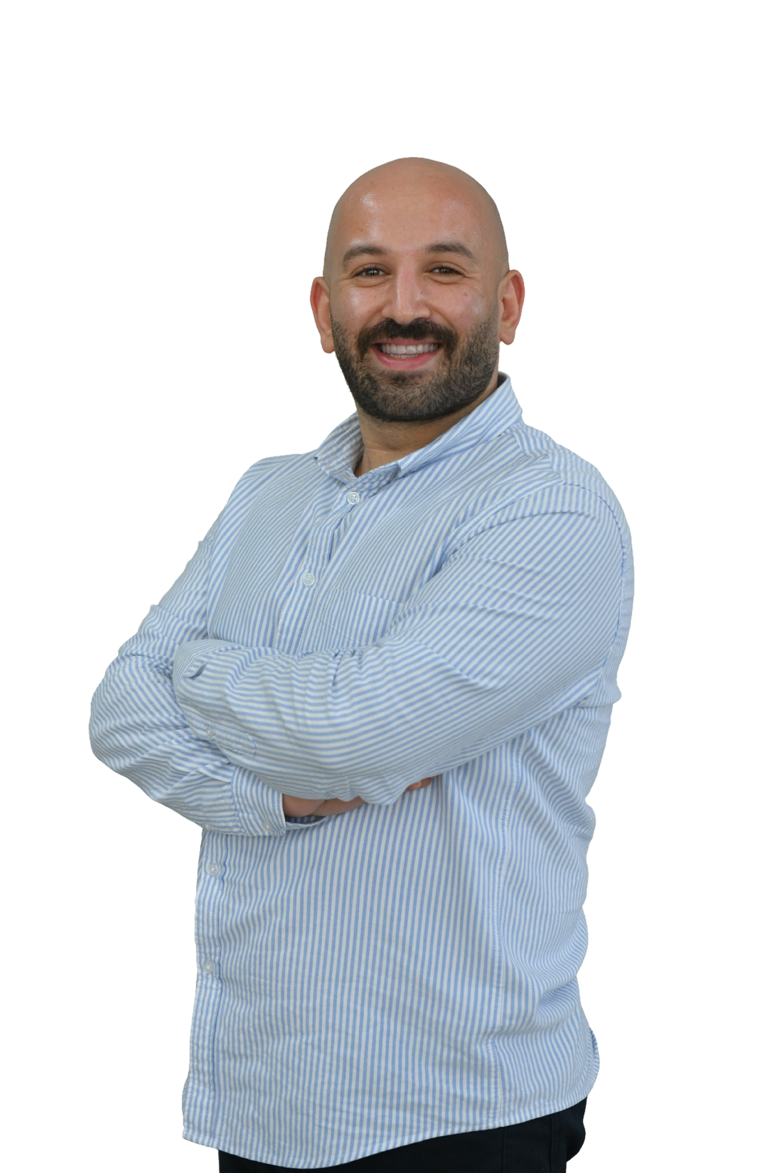 Reda Helbawi, entrepreneurship programs consultant and startup coach, standing with arms crossed and smiling